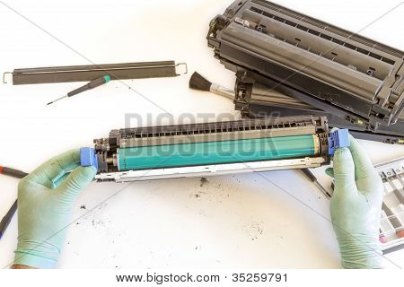 Hands Repairing Toner Cartridge