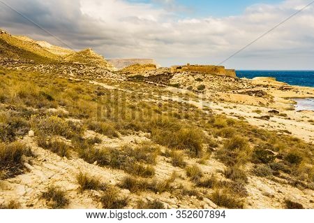 Castle San Ramon Above Beach Of El Playazo, Cabo De Gata Nijar, Province Almer
