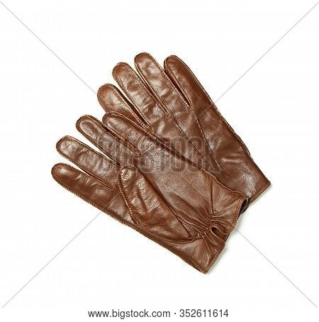 Brown Classic Leather Mens Gloves On White Isolated Background Top View. Stylish Fashionable Winter 