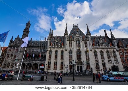 Bruges, Belgium. August 2019. The Market Square Is One Of The Main Squares In The Historic Center: T
