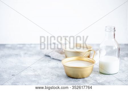 Makgeolli Rice Wine Is One Of The Oldest Korean Traditional Fermented Alcoholic Drinks In Cup And Gl
