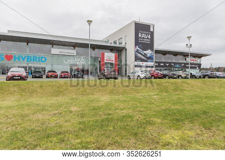 City Riga, Latvia. Toyota Dealer Center And Cars On The Street.