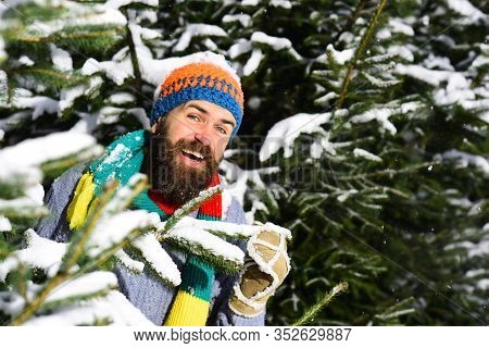 Happy Winter Vacation Concept. Man With Hat, Scarf And Glove.