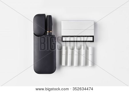New Generation Black Electronic Cigarette In Open Battery, One Pack, Five Heatsticks Isolated On Whi