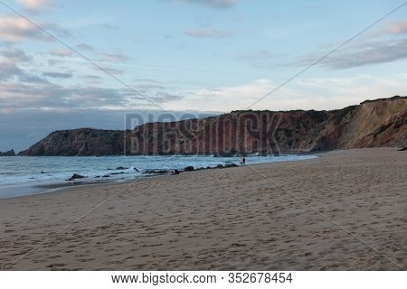 Praia Do Amado Beach At Sunset In Costa Vicentina, Portugal