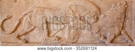 Ancient Bas-relief With A Scene With Lion Attacking A Bull From Ekatontapyliani Church On Paros Isla