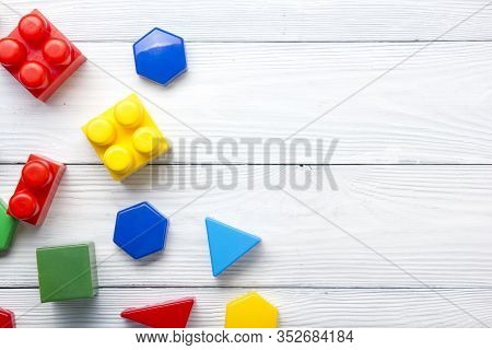 Kids Educational Developing Toys Frame On White Background. Top View. Flat Lay. Copy Space For Text