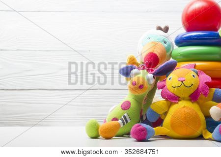 Kids Educational Developing Toys Frame On White Background. Top View. Flat Lay. Copy Space For Text