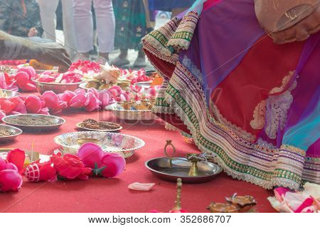 Wedding Ceremony, Traditional Indian Hindu Marriage Ritual With Red Flowers And Attributes