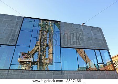 Headframe Of C-mine In Belgium Reflected In Glass