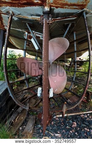 The Rudder And Propeller Of An Old Fishing Boat At The Fishing Harbour Of Kalajoki, Finland. The Rus