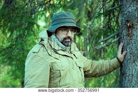 Caucasian  Travel Hiker In Forest .boondocks Taiga
