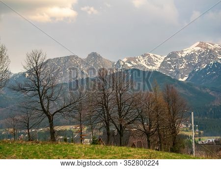 Scenic View Of Koscielisko Village With Panorama Of High Tatras On Background, Poland