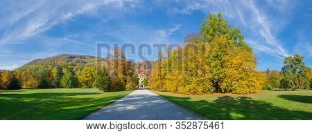 Colorful Autumn Colors, Bright Blue Sky In The Park And Eggenberg Palace In Graz, Styria Region, Aus