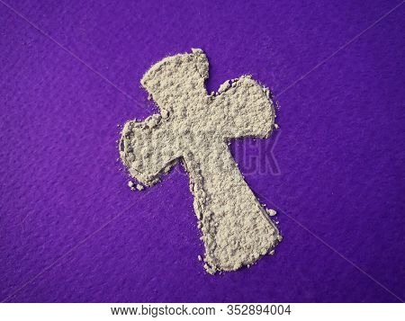 Ash Wednesday, Lent Season And Holy Week Concept. A Christian Holy Cross Shape On Background Of Scat