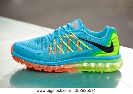 Nike Air Max 2015 Running Shoes, Sneakers, Trainers In Blue Green Orange Colorway Shot Outdoors On A