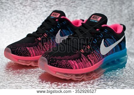Nike Flyknit Air Max Running Shoes, Sneakers, Trainers Close Up View, Shot On Silver Metallic Backgr