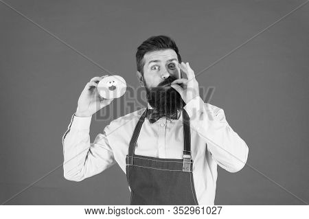 You Will Lick Your Fingers. Bearded Man Enjoying Sweet Taste Of Doughnut On Red Background. Baker Ea