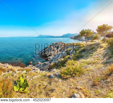 Gorgeous Sunny Day Over Sant'elia Village. Popular Travel Destination Of Mediterranean Sea. Location