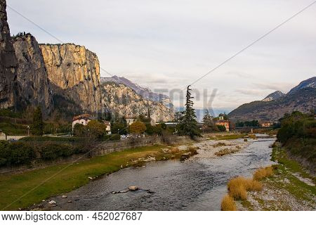 The Sarca River As It Flows Through The Small Town Of Arco On The North Garda Plain On Its Way To La