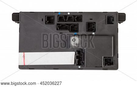 Plastic Car Engine Control Unit With Metal Elements On A White Isolated Background Is The Connecting