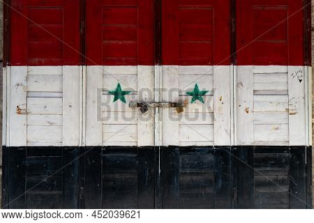 Syrain Flag Painted On A Door At A Shop In Damascus Market