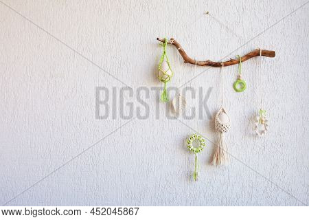 Macrame Flower Accessory. Easter Time. Spring Easter Walhanging Decor On Wooden Stick. Copy Space