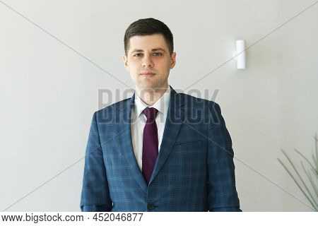 Portrait Of A Male Freelancer. Decentralized Work Of Digital Nomads, Hybrid Work Model.