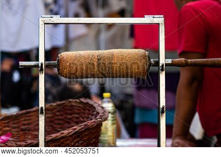 Kurtos Kolacs (kürtőskalács). Traditional Hungarian Cake, Baked With Sugar, Honey And Nuts