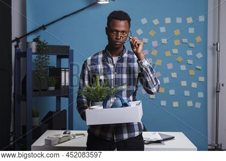 Jobless Company Worker Carrying Belongings And Thinking About Failed Career. Entrepreneur Getting Fi