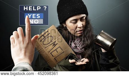 A Beggar Sad Woman Holds A Cardboard Sign With The Inscription Homeless And Looks At Coins From A St