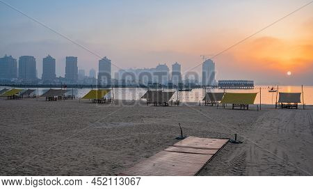 Doha, Qatar - March 03,2022 :beautiful Katara Beach During The Early Morning With Mist In The Backgr