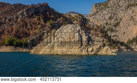 Stone Cliffs At Oymapinar Dam In Green Canyon In Turkey