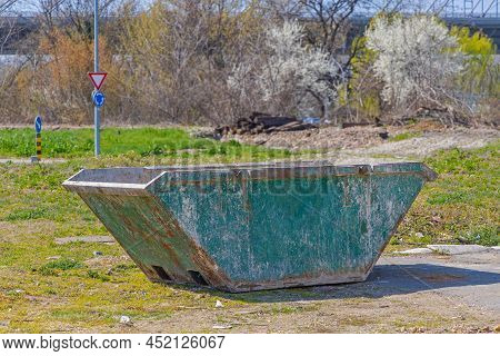 Old Steel Metal Skip Bin Container At Field