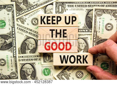 Keep Up The Good Work Symbol. Concept Words Keep Up The Good Work On Wooden Blocks. Businessman Hand