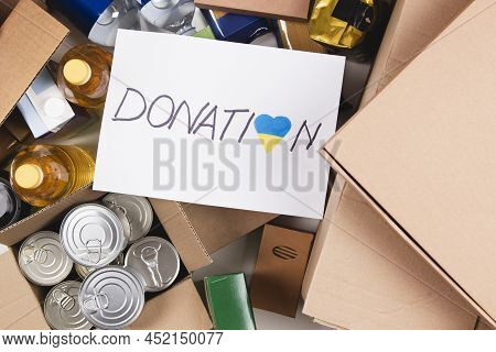 Donation For People From Ukraine. Food Donations Boxes With Grocery Products. Top View