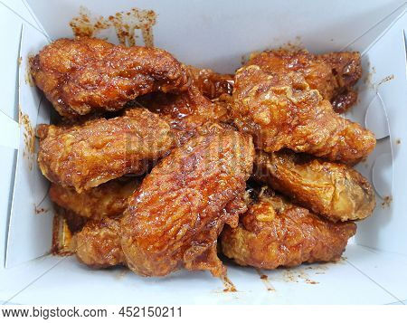 Korean Food Style, Top View Of Spicy Chicken On White Plate In Restaurant, Yangnyeom Tongdak Is Kore