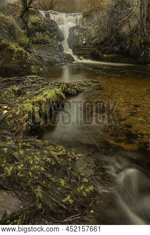 Epic Landscape Image Of Aira Force Upper Falls In Lake District During Colorful Autumn Showing