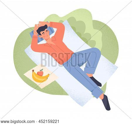 Relaxed Man Outdoor. Young Guy Lying On Blanket With Fruit. Weekend Rest In City Park. Person Relaxi