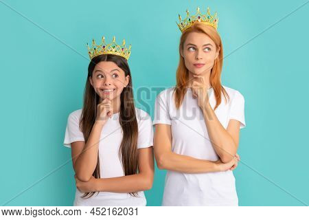 Being In Doubt. Selfish Mother And Daughter Child With Pensive Smile. Selfish And Egoistic