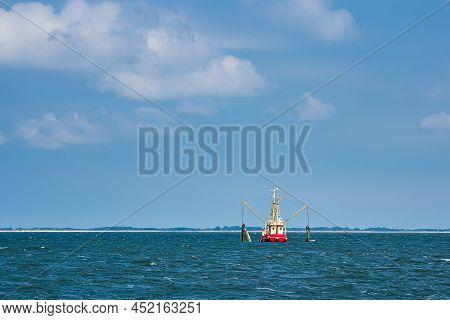 Shrimp Boat On The North Sea Near Island Pellworm, Germany.