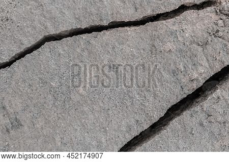 Large Crack After Earthquake On The Soil Surface Of The Earth Damaged Ground Background Climate Patt
