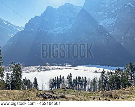Frozen Klöntalersee Or Klontaler Lake During Early Spring In The Alpine Valley Klöntal (kloental Or 
