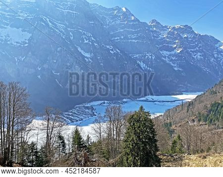 Frozen Klöntalersee Or Klontaler Lake During Early Spring In The Alpine Valley Klöntal (kloental Or 