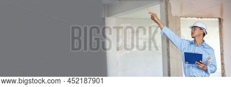 Banner Man Construction Engineer Writing Notepad Wear Plaid Shirt Safety White Hard Hat At Construct
