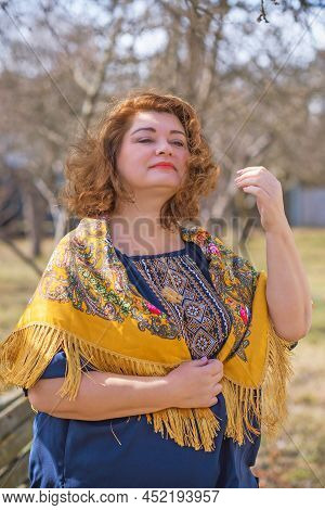 European Plus Size Ethnic Woman In Embroidery Traditional Shirt And Scarf. Concept Of National Costu