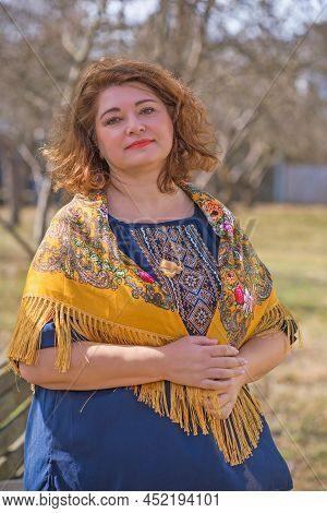 European Plus Size Ethnic Woman In Embroidery Traditional Shirt And Scarf. Concept Of National Costu