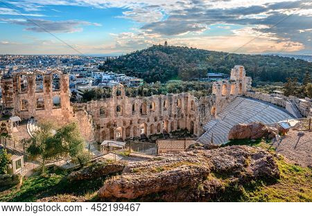 Sunset Over The Odeon Of Herodes Atticus, Located On The Southwest Slope Of The Acropolis, In Athens