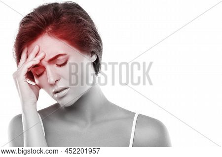 Woman With A Source Of Red Painful Headache
