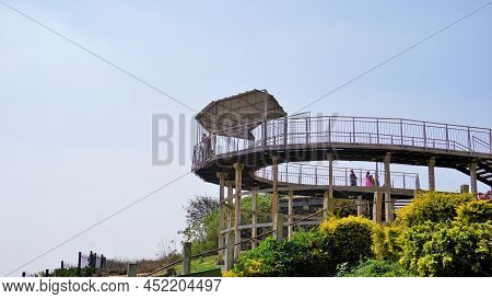 Tourist Enjoying Beautiful View From Top Of Nandi Hills